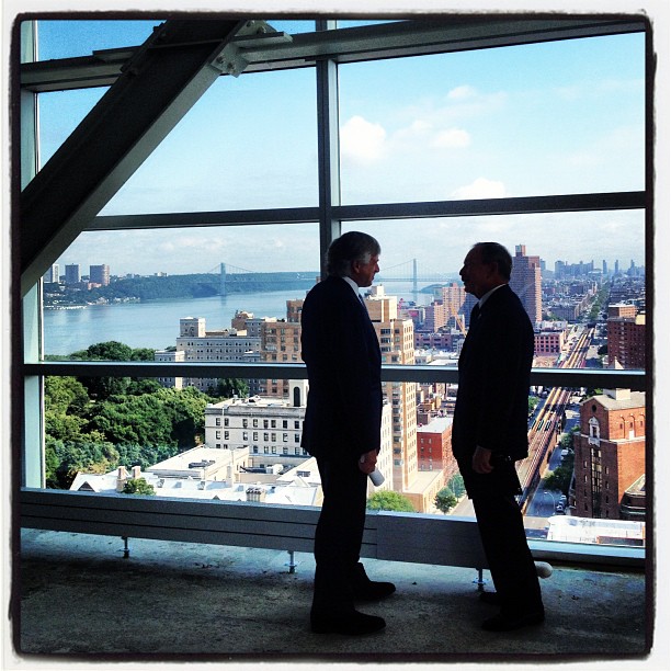 Bollinger and Bloomberg look over Manhattanville from a new building